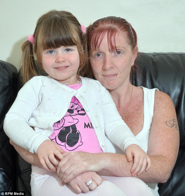 Warning: Penny Jordan (right) has warned parents of venomous spiders after her daughter Elle, four, was bitten in her bedroom and left with a swollen leg and red rash which spread over her body